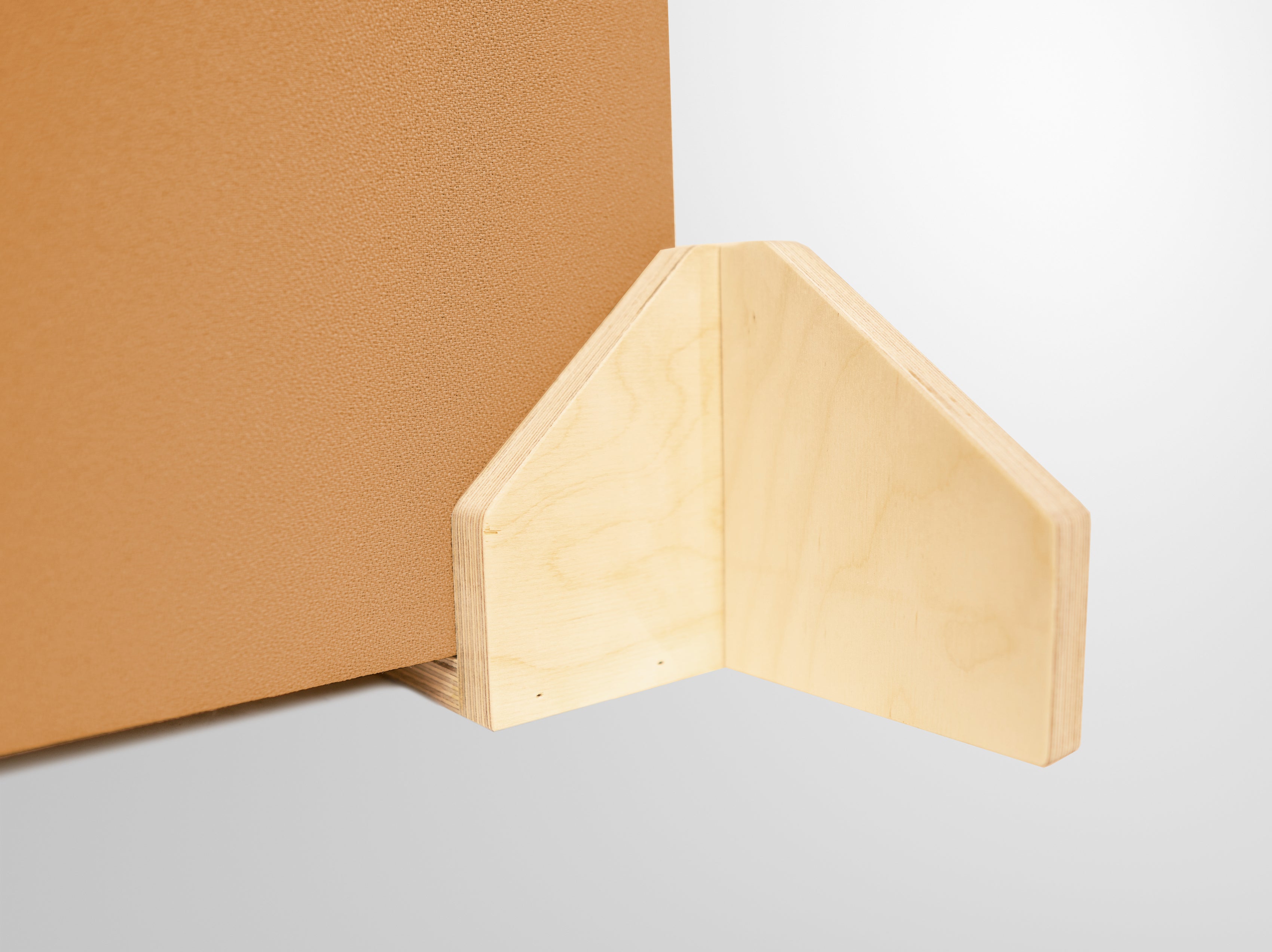 Detail of Music City Acoustics bookend feet - broadband acoustic panel mounted in bookend feet in natural studio white background 